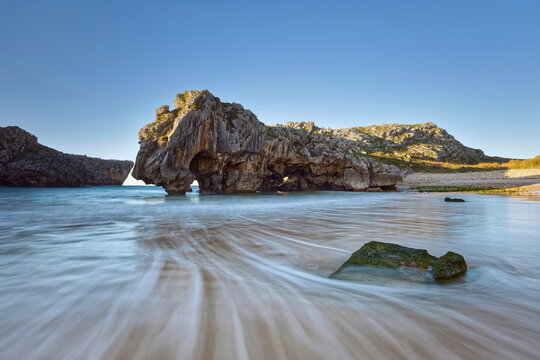 Playa Cuevas del Mar Beach, scenic karst area stated a Natural Monument due to the geological value of its rock formations. Llanes-Asturias-Spain-076
