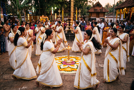 Thiruvathira dancers in traditional white sarees with gold borders dancing in a circle