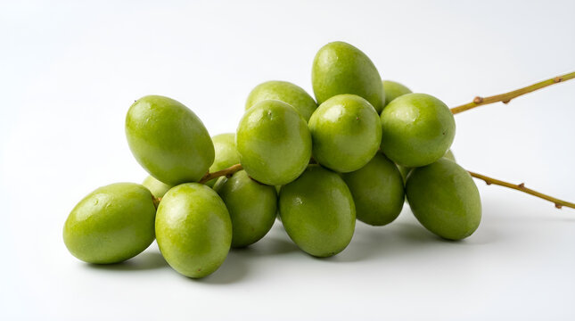 Bunch of fresh glossy oval green young dates stacked on small brown stem, smooth shiny texture, raw ruthob date fruit, isolated clean white minimalist background