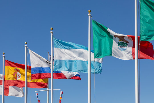 historic flag flutterin in the wind, the flags are from historic periods in california