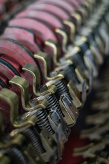 An Industrial Mechanical Components Assembly with Springs and Red Pulleys © Nicolas GR