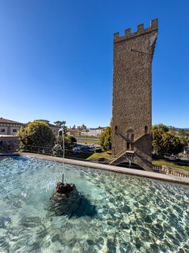 Fountain and the San Niccolo tower in Florence, Italy