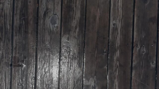 Dark Aged Wooden Floor Surface with Rain Water Puddles and Drops Background