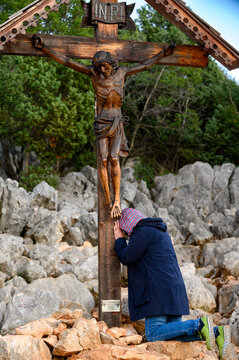 A wooden crucifix with Jesus Christ on Mount Podbrdo, the Apparition Hill overlooking the village of Medjugorje, Bosnia and Herzegovina.