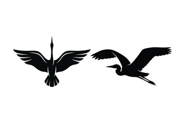 Fototapeta premium Flying heron and crane bird silhouettes with spread wings for wildlife conservation and nature art