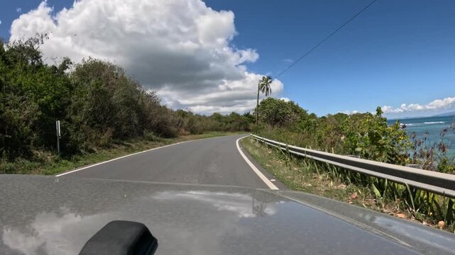 POV Driving Along a Scenic Coastal Road in Vieques, Puerto Rico