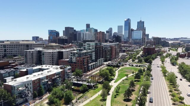 Aerial view of apartments and business buildings along Cherry Creek trail in downtown Denver, Colorado.