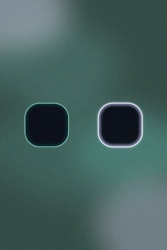 Two softly glowing rounded-square controls float on a textured dark green field, delivering a minimal, modern feel for mobile UI and product screens.