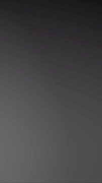 Abstract grey gradient background with smooth soft light transitions for design projects.
