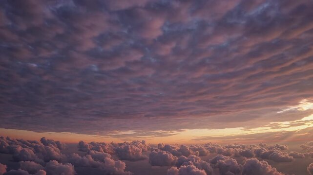 Aerial video captures a vast, serene sky with fluffy clouds at sunset. The low-angle view emphasizes the expansive, tranquil atmosphere. Live desktop wallpaper.
