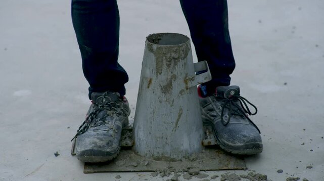 Concrete Slump Test With Abrams Cone at Construction Site