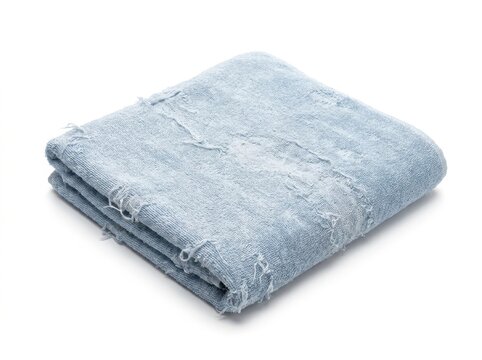 A threadbare bath towel worn thin and patchy