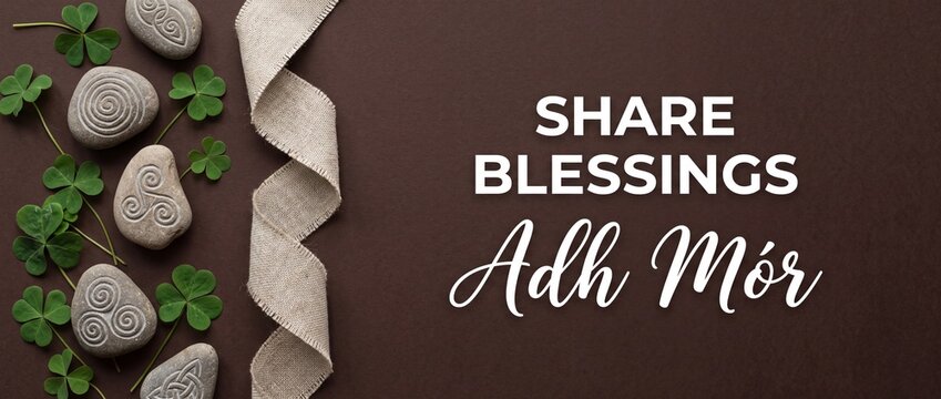 St Patricks Day Shamrock Background with Celtic carved stones, burlap ribbon, and Irish blessing Adh Mor text on brown background for holiday greeting card banner and lucky celebration copy space conc