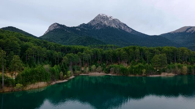 Aerial of Doxa Lake with Forest and Mountains Bacckground in Feneos, Corinthia, Greece