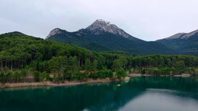 Aerial of Doxa Lakeside, Road Mountain and Forest Nature Scenery, Feneos, Corinthia, Greece