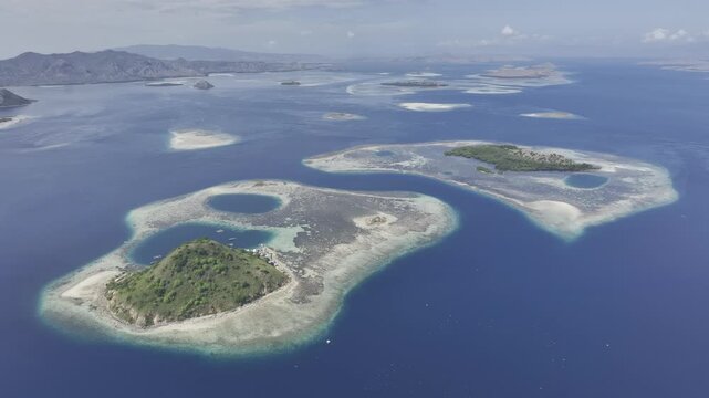 Aerial view of the natural scenery of the coral atolls in East Nusa Tenggara, Komodo, Indonesia