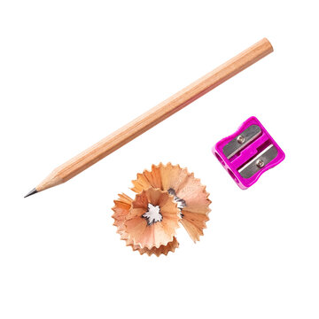 Wooden pencil, pink sharpener, and fresh wood shavings, depicting creativity and education.