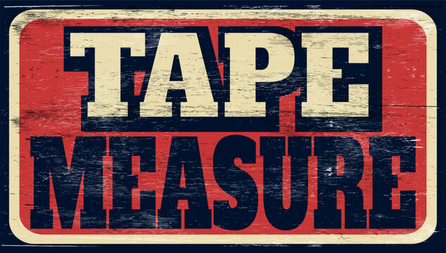 Aged vintage tape measure sign on wood