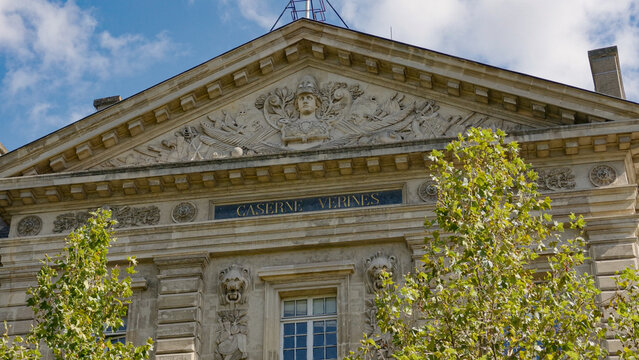 Caserne Verines, a historic barracks building, featuring detailed architectural relief sculptures in Paris