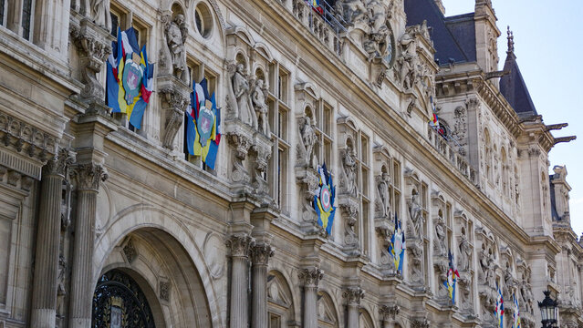 Hotel de Ville, a historic landmark in Paris, France, featuring detailed architecture and flags