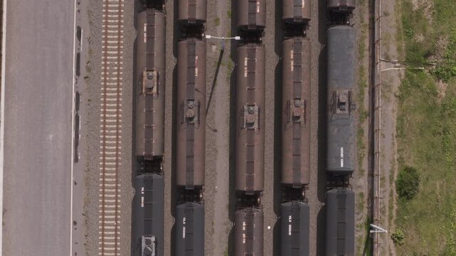 Freight rail cars lined on parallel tracks at the Port of Veracruz, Mexico, aerial