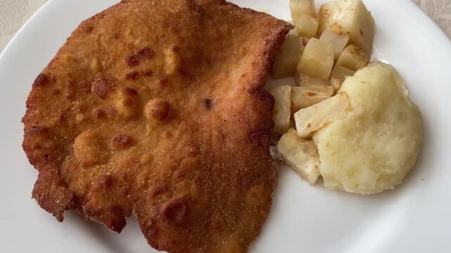 Milanese-style turkey cutlet. Italian Turkey Milanese.