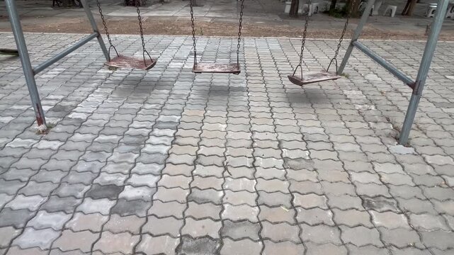 Wooden swings at public park