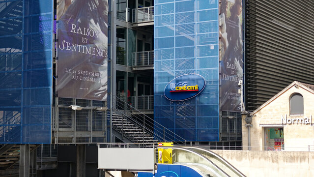 PARIS, FRANCE - SEPTEMBER 1, 2026 - Bercy Village featuring UGC Cine Cite cinema with blue screens and outdoor escalators