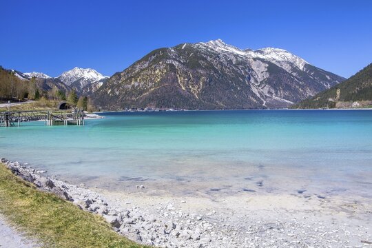 Lakeshore with bright water colours, municipality of Eben, Achensee, Tyrolean Alps, Tyrol, Austria