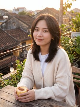 Woman Holding Vietnamese Egg Coffee on Hoi An Rooftop