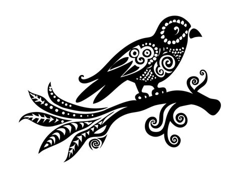 Decorative black bird perched on an ornate branch with intricate patterns