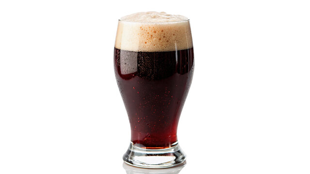 Glass of fresh dark beer stout ale beverage with thick white foam head