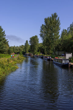 The Forth and Clyde Canal near the Falkirk Wheel, a rotating boat lift connecting the Forth and Clyde Canal with the Union Canal in Falkirk, Scotland.