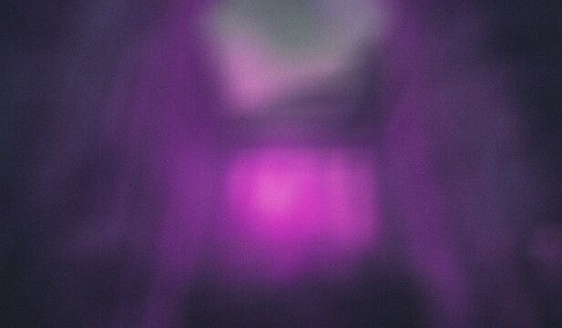 Abstract purple gradient background with soft glowing light, blurred background texture