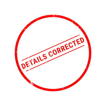 A bright red circular rubber stamp design featuring the text details corrected centered inside with two horizontal lines above and below the words