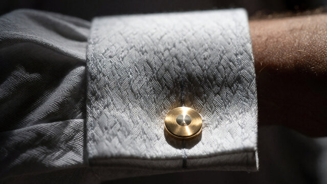 Luxury gold cufflinks close up