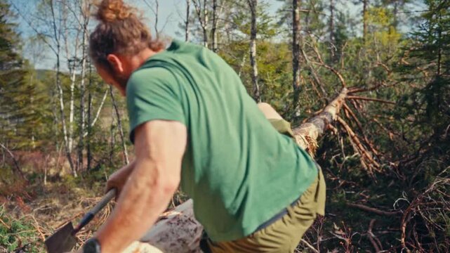Timelapse of a man removing bark from a tree trunk during outdoor forestry work, exposing the wood beneath the bark