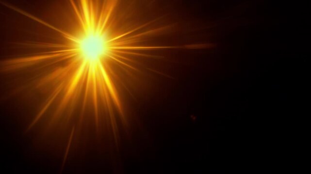 Real Shooted Orange Lens Flare Overlay in Motion Isolated on Black Background in Slow Motion.