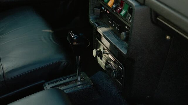 A look at the inside of a classic Volvo 262C Bertone car. The video shows the gear shift and control panel in detail. This is a unique piece of automotive history.