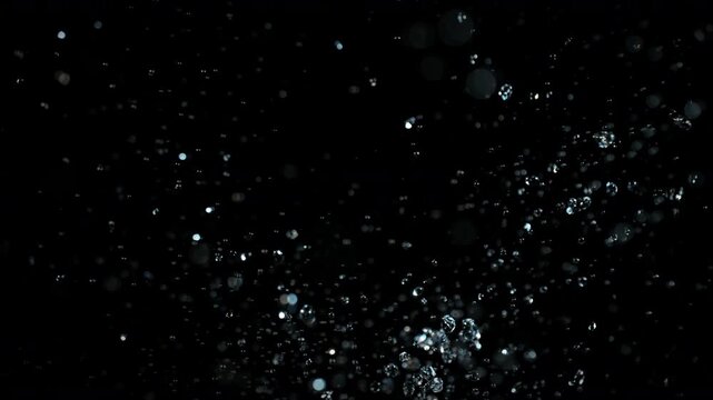 Super Slow Motion Shot of Water Drop Explosion Towards Camera at 1000fps. Cinematic Background.