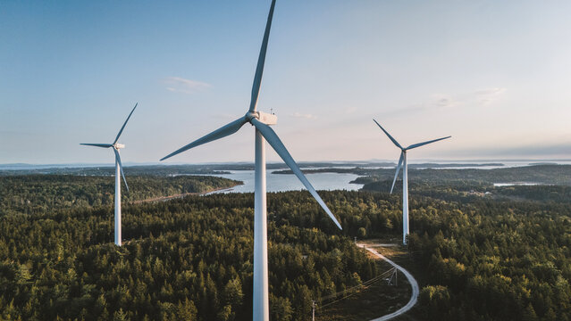 Wind turbines over a vast coastal forest landscape, Vinalhaven, Maine