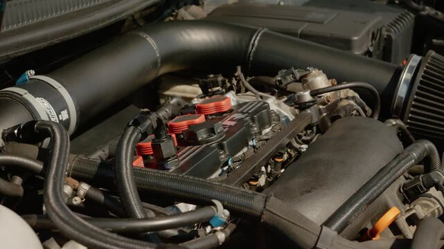The inner parts of four-cylinder engines during a detailed examination. Watch as different components are highlighted and discussed in detail.