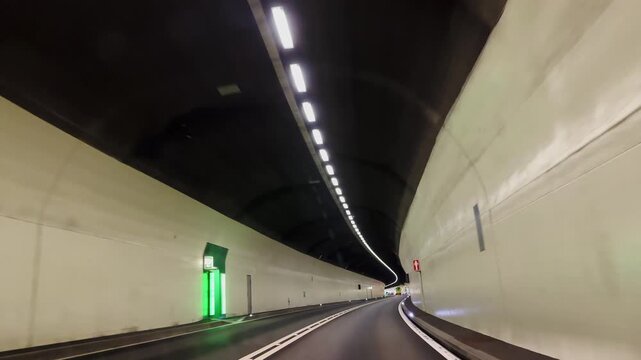 Car Point of View in a Mountain Road Tunnel in the Swiss Alps in Via Mala, Grisons, Switzerland.