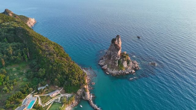 Aerial view of Paralia Fieroulas on Corfu island with a luxury villa