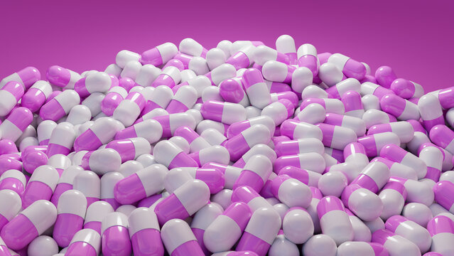 Pile of purple and white capsules used as medication