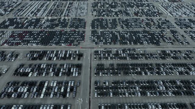 Aerial view new car lined up, Automobile automotive car parking lot commercial business industry, Port of import export business logistic dealership, New cars global business logistic import export.