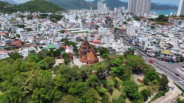 Ancient Cham Ponagar (Po Nagar) towers on green hill in Nha Trang city, Vietnam.