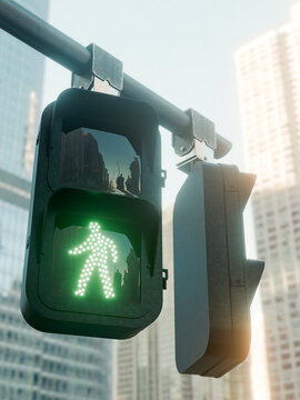 Green pedestrian signal illuminated, indicating it is safe to cross the street