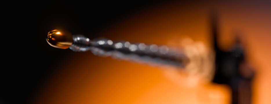 Bullet in motion captured mid-flight with dramatic lighting and motion blur