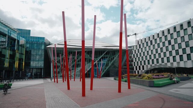 Grand Canal Square, a modern public plaza in Dublin, Ireland, featuring distinctive red angled light rods and geometric paving Dublin, Ireland - 28 August 2026.